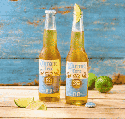 Place the lime wedge in the neck of the bottle